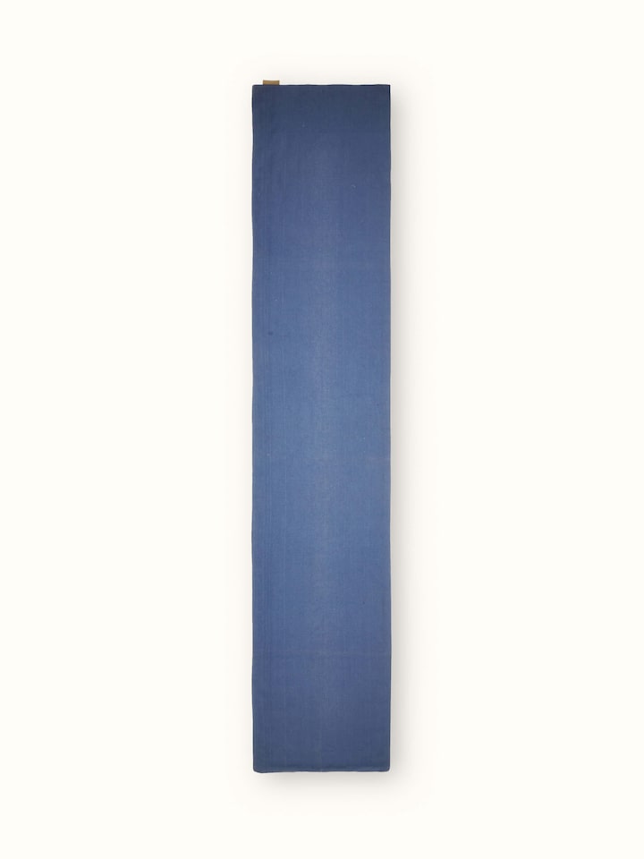Back view showing the finish and reverse side stitching of Rann linen bed runner.