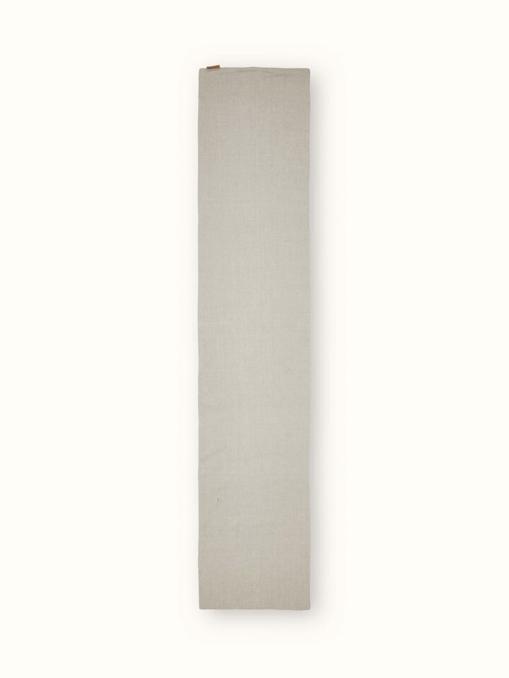 Back view of linen bed runner showing fine finishing and fabric quality.