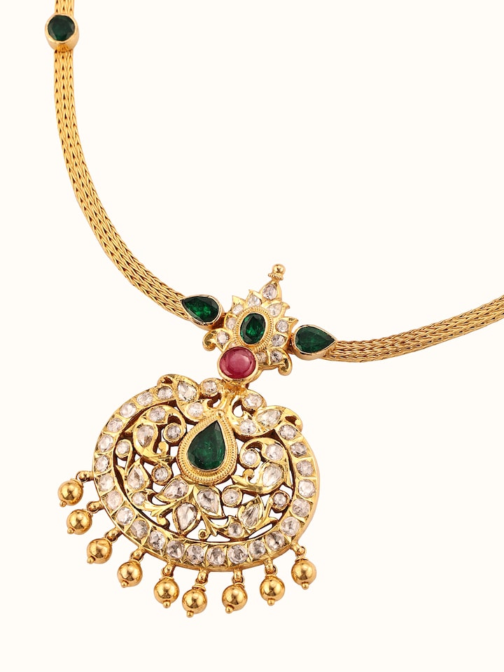Overhead shot capturing the elegant design and rich texture of the 22 Karat gold necklace
