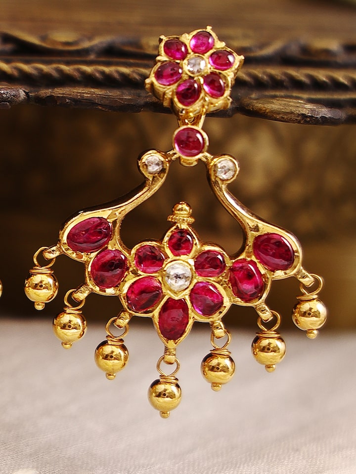 Detailed view of Kundala Velai 22 Karat Gold Jhumkas showcasing the intricate design and luxurious gold finish.