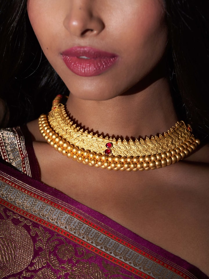 Close-up view of Thushi 22 Karat Gold Choker featuring detailed goldwork and elegant design