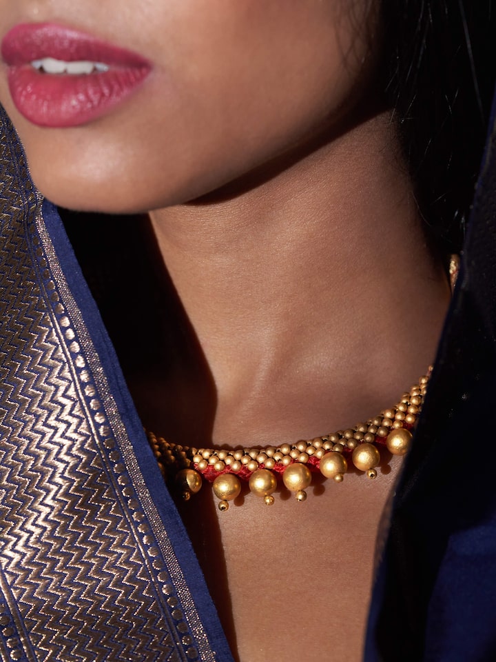 Side view emphasizing the layering and structure of the piece