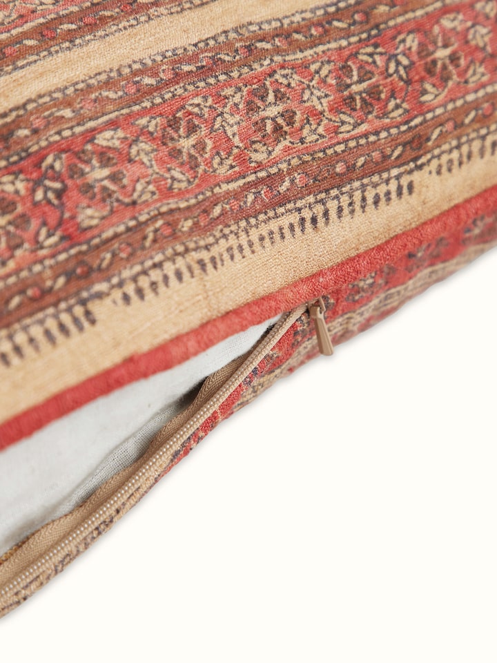 Detailed view of Vasudha rust stripe tussar silk Bagru hand block print cushion cover highlighting the silk texture and print.
