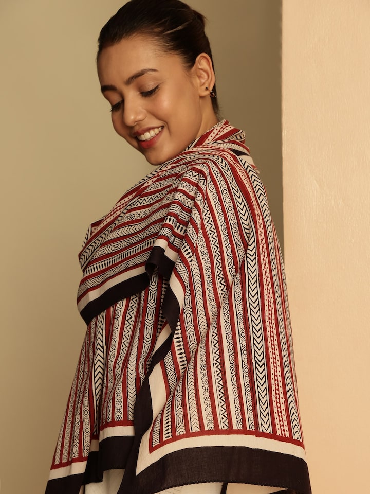 Styled view of Black Cotton Bagh Block Printed Stole draped on the shoulder showing the drape