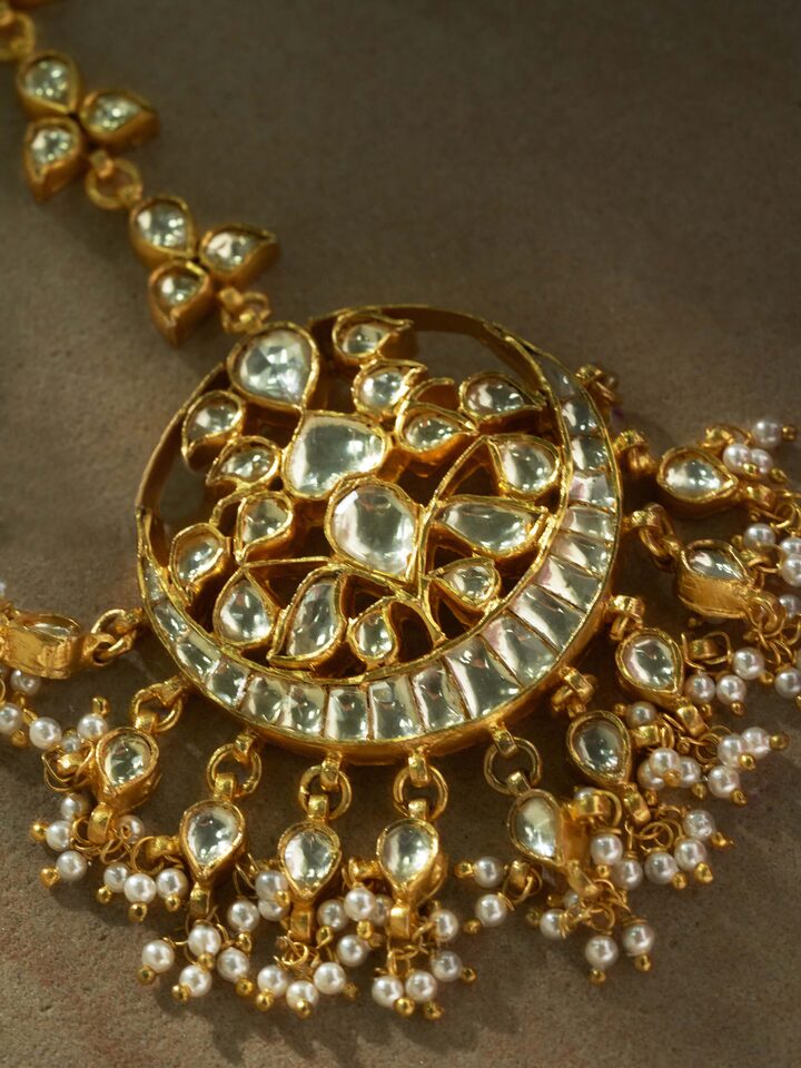 Detail view of Silver Smithing Maang Tika highlighting the stone setting and metalwork detail