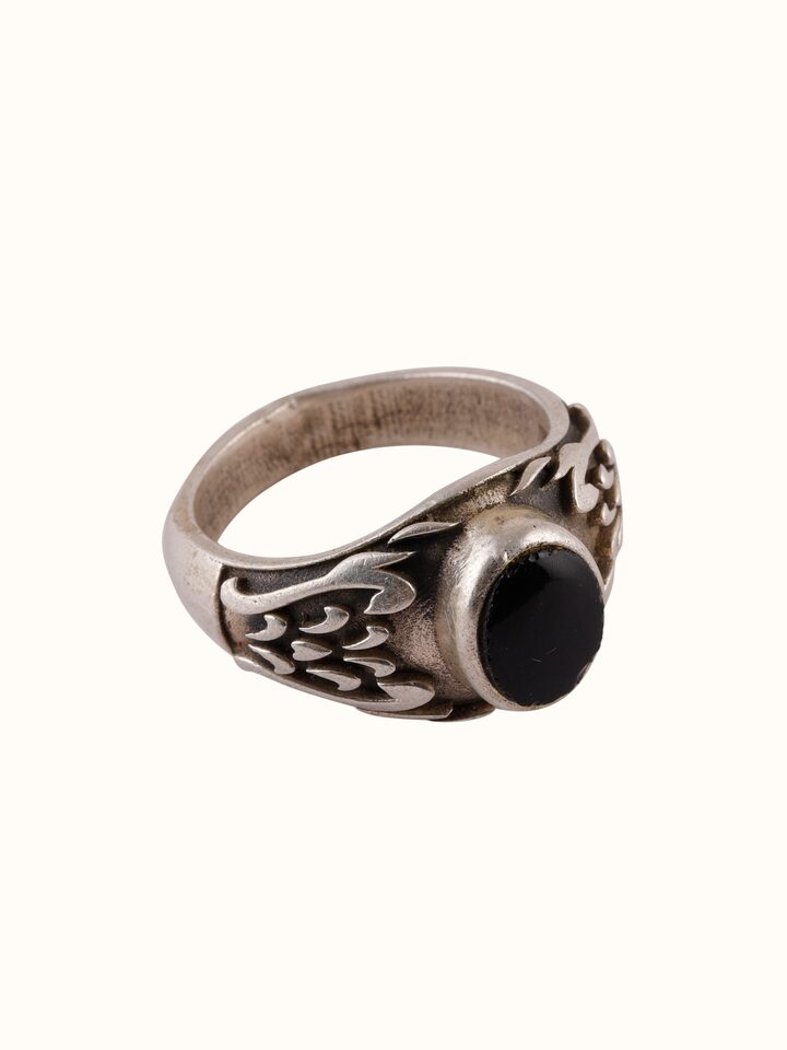 Back view of Chitai Silver Ring featuring the smooth inner band and detailed silverwork.