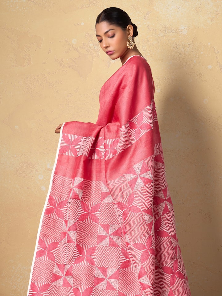 Angled view showcasing the elegant drape of Tussar Silk Sujani Embroidered Saree
