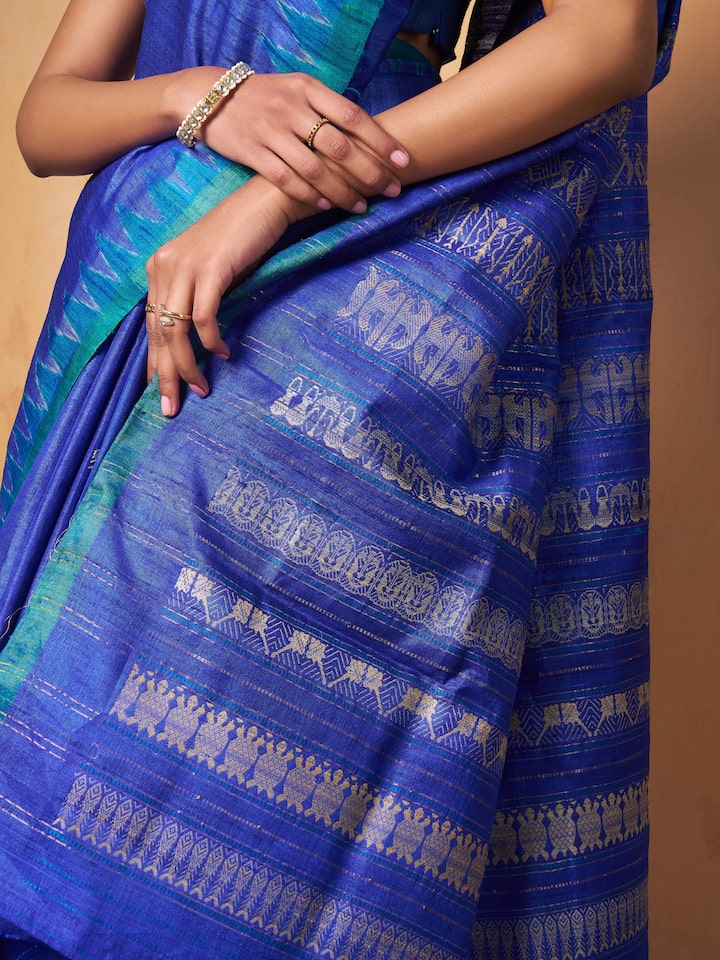Back view of Tussar Silk Saree with intricate designs and fabric detailing