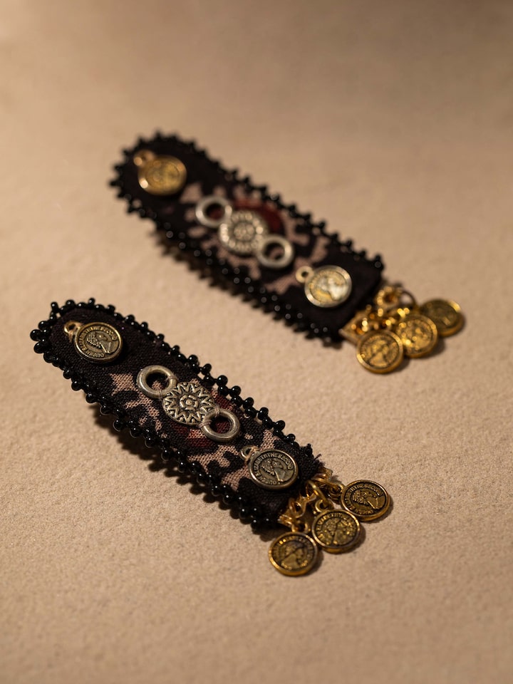 detail view of ajrakh drop earrings pattern