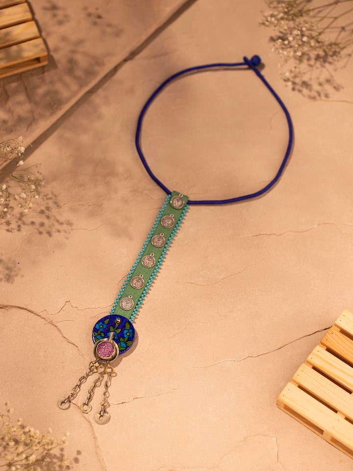 Side view of Ajrakh long necklace showcasing handcrafted detailing and length of the piece