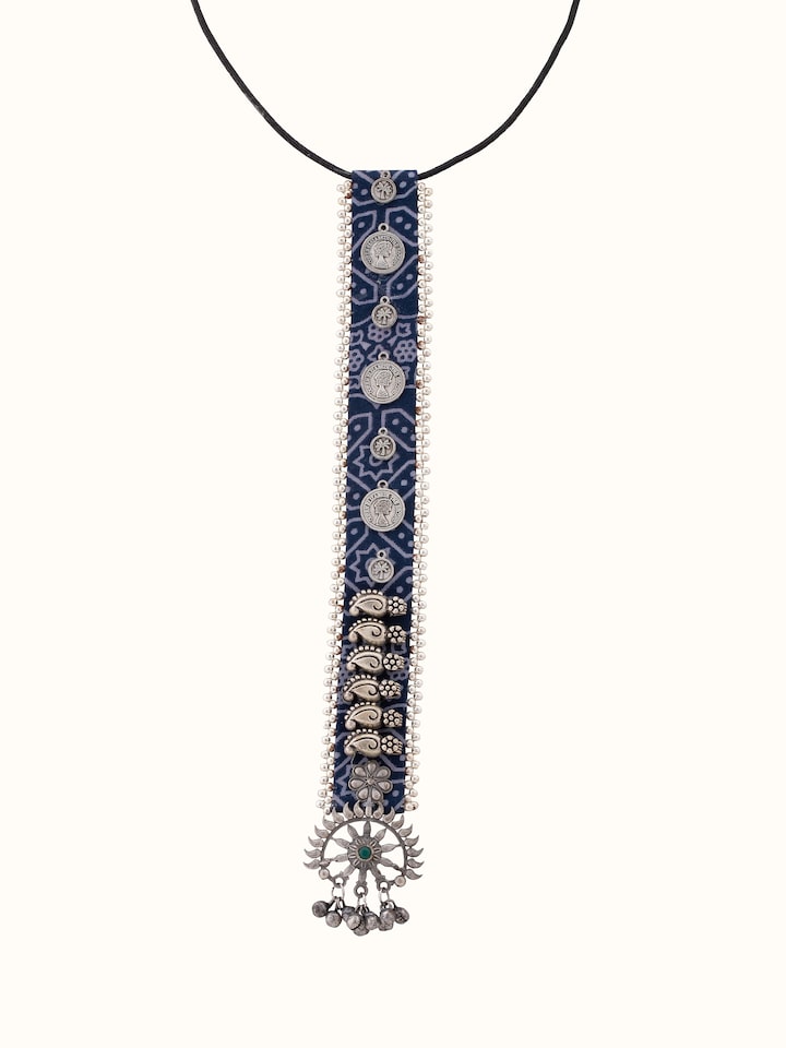 Front view highlighting the detailed Ajrakh fabric pattern on the pendant
