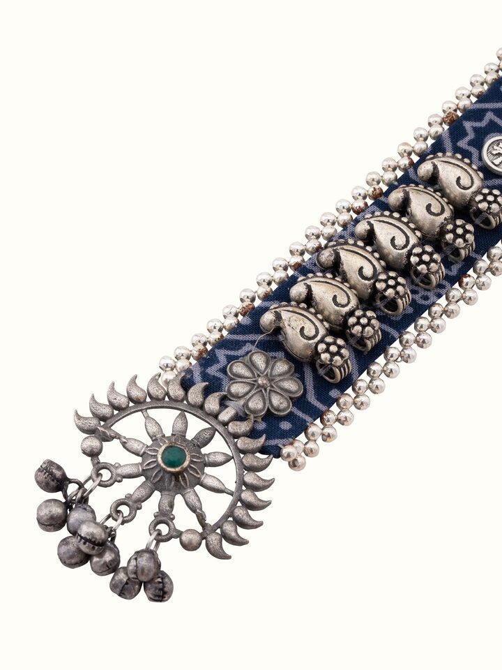 Overhead view capturing the full necklace layout and length