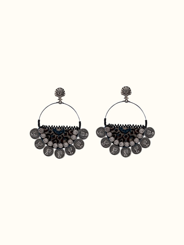 front view of ajrakh drop earrings with traditional block print design