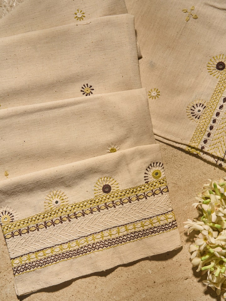 Close-up to show the detailed needlework and cultural richness.
