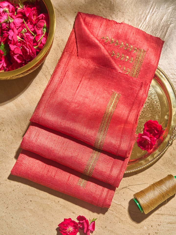 Lifestyle view of pink Zardozi embroidered Tussar blouse piece styled with complementary attire