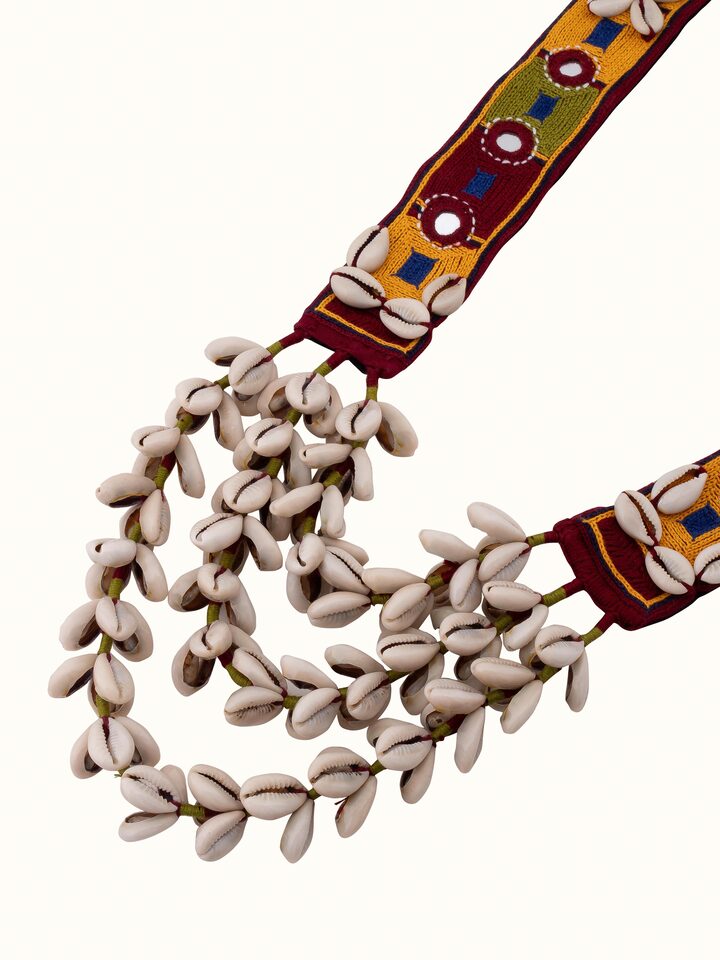 Overhead view of Banjara Embroidery Long Necklace displaying detailed embroidery and elaborate design.