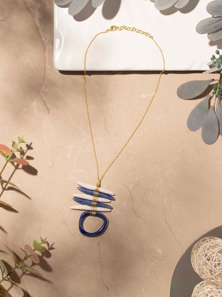 Side view of ceramic long necklace highlighting intricate bead patterns and craftsmanship