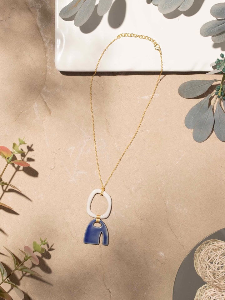 Side view of Ceramic Long Necklace highlighting the unique ceramic bead design and elegant chain.