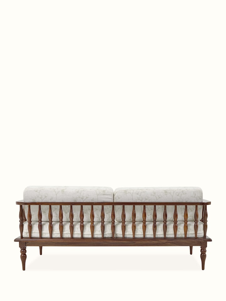 Close-up view of the teak finish and upholstery details on the Sheesham wood 3-seater sofa, highlighting the craftsmanship