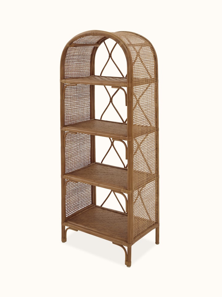 Angled view of the cane bookshelf, focusing on the unique texture and functional shelves