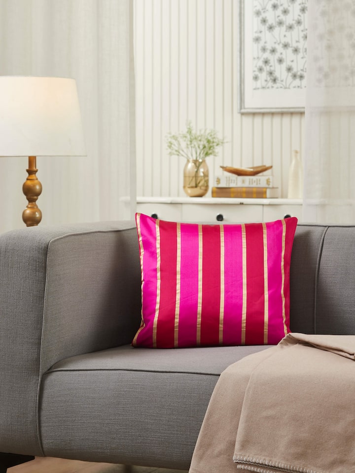 Close-up view of Aarcha raspberry stripe silk brocade Banarasi handloom cushion cover, highlighting the intricate details.