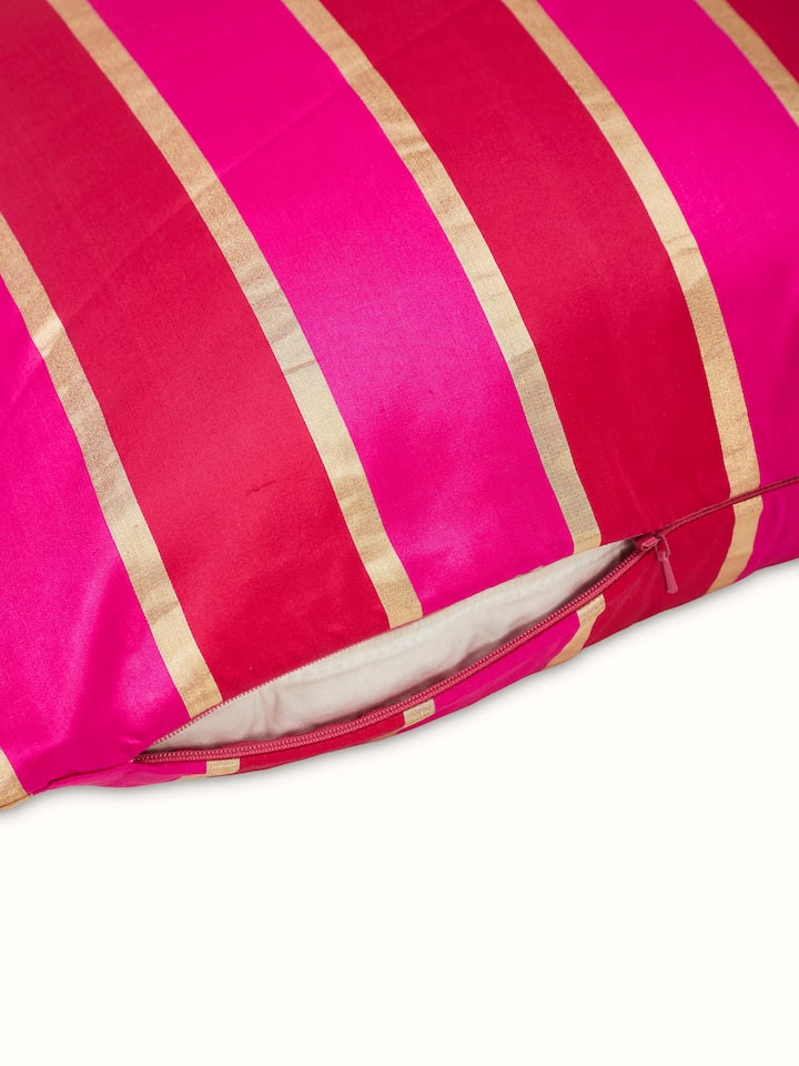 Detailed image of Aarcha raspberry stripe silk brocade Banarasi handloom cushion cover, focusing on its brocade fabric.
