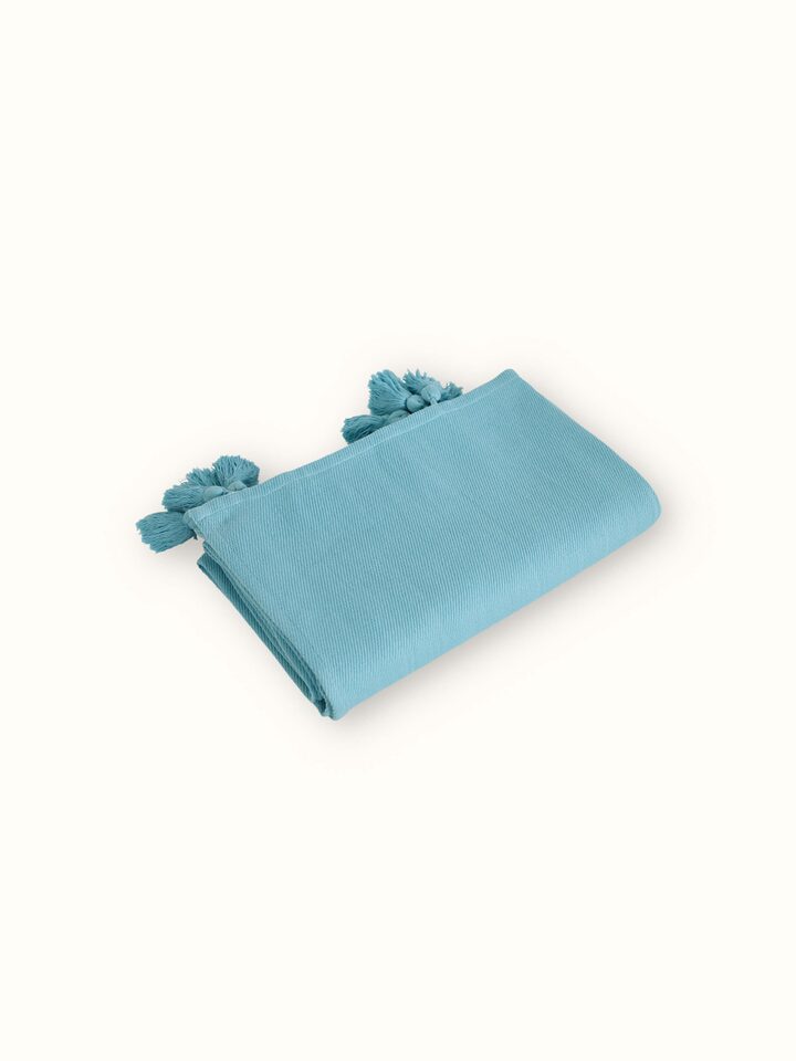 Detailed view of Tavas turquoise twill cotton handloom throw highlighting the twill pattern and fabric finish
