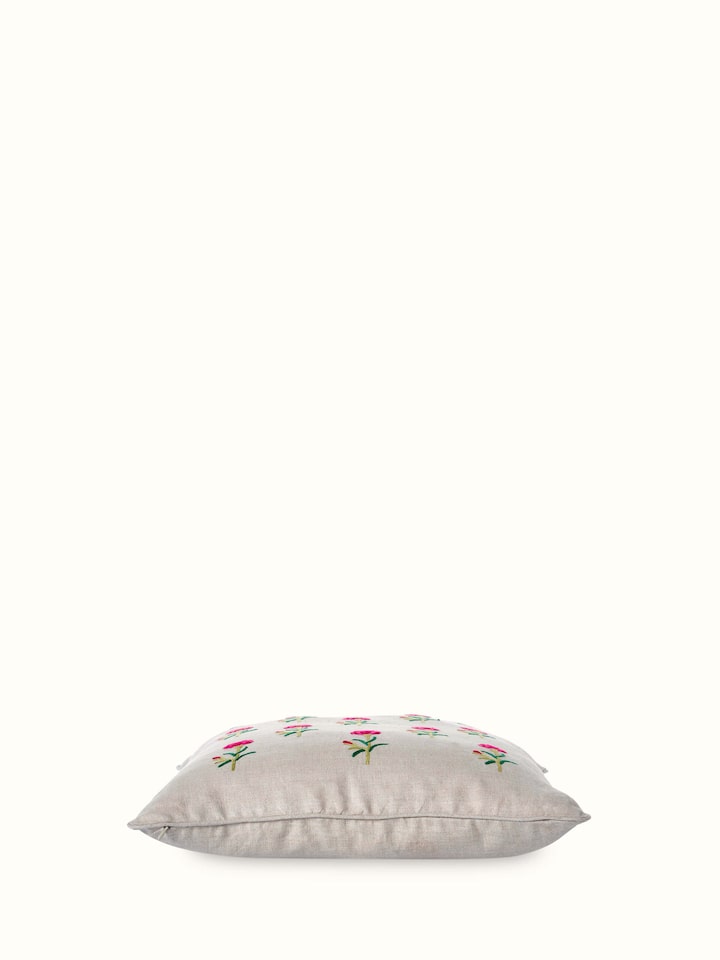 Mughal miniature magenta buti linen crewel hand embroidered cushion cover with a focus on the vibrant magenta buti design and linen texture.