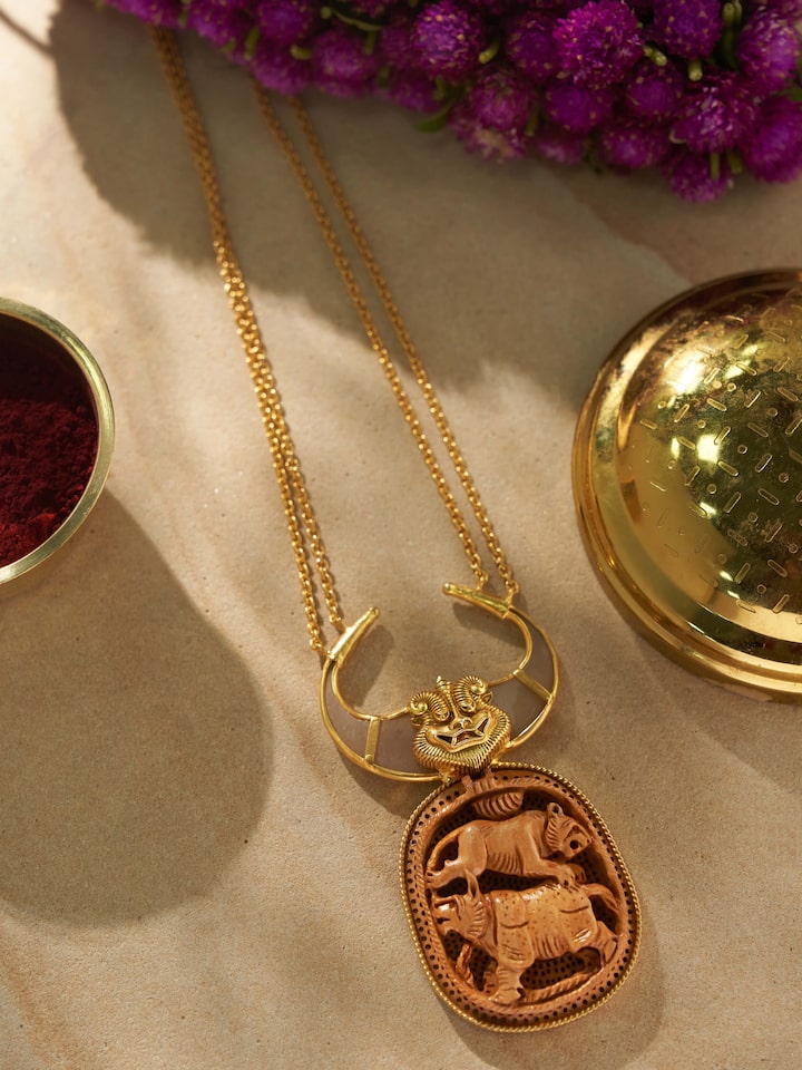 Styled view of Carved Wood & Silver Long Necklace worn around the neck, showing how it looks styled