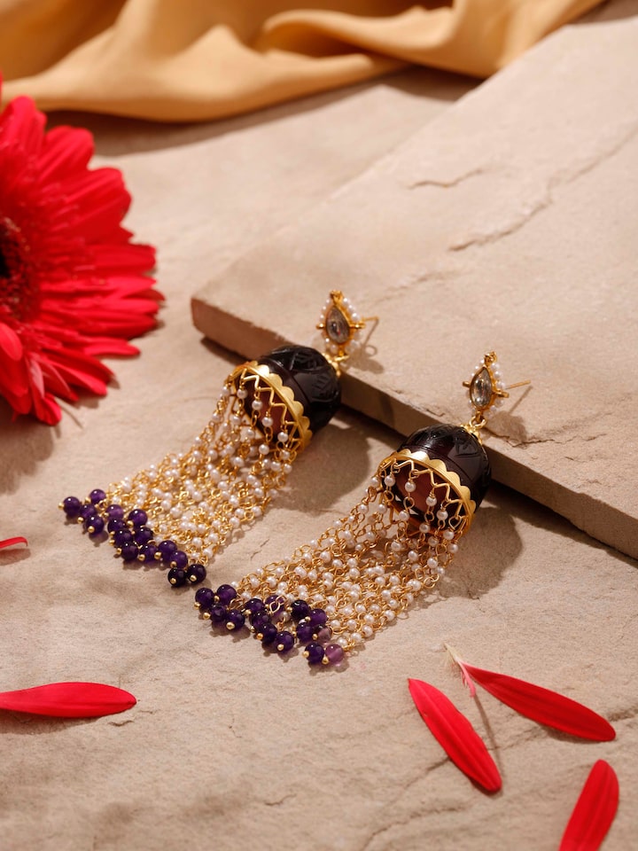 Angled view of Silver Smithing Jhumkas showcasing the elegant design and craftsmanship.