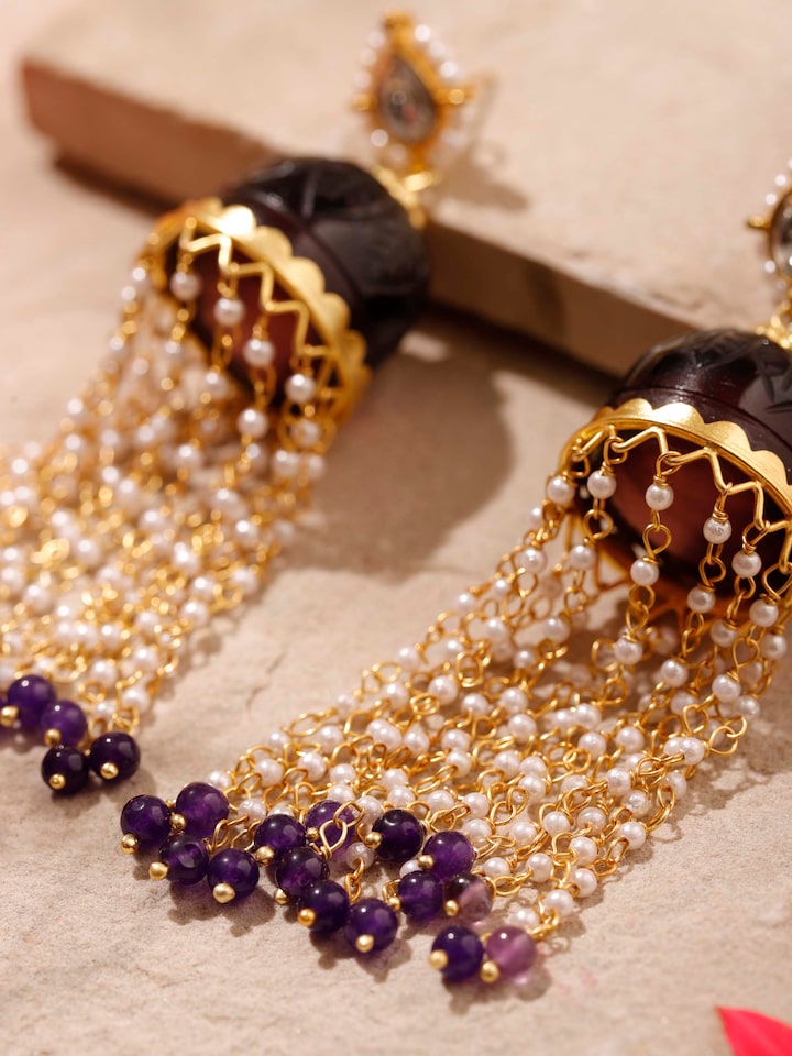 Detailed view of Silver Smithing Jhumkas highlighting the traditional patterns and embellishments.