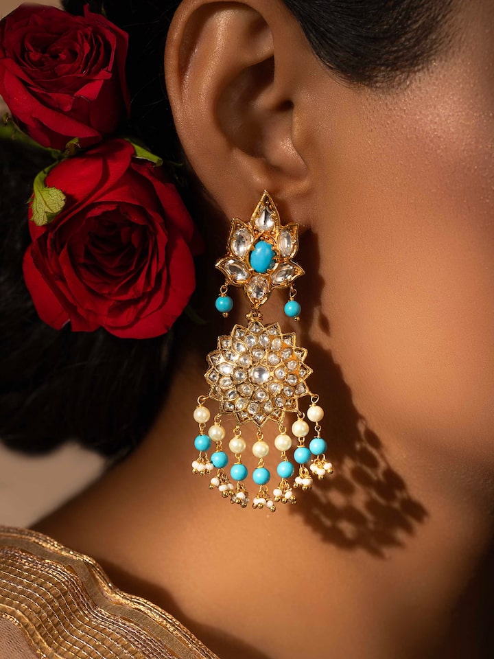 Close-up of Bandhel metal drop earrings emphasizing craftsmanship and quality