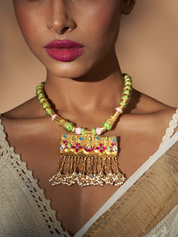 Side view of Silver Smithing collar necklace showcasing detailed metalwork and intricate design