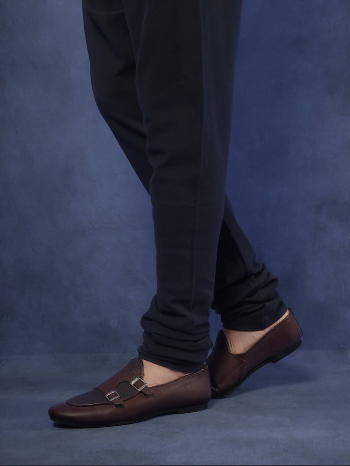 Angled view of churidar emphasizing slim fit and stretchable cotton fabric.