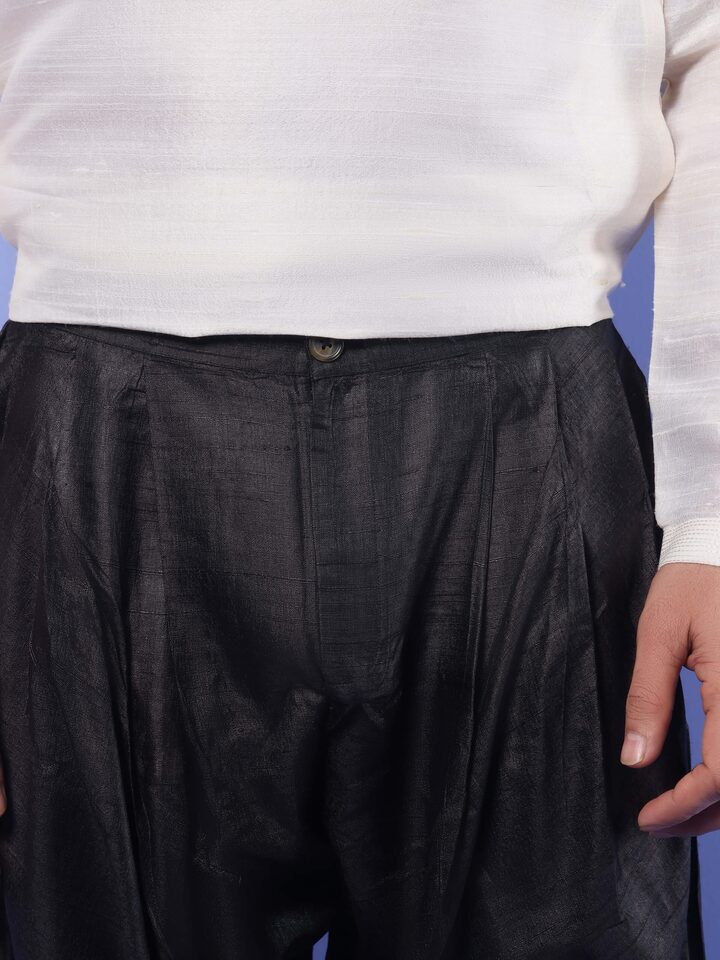 Side profile that emphasizes the refined tailoring and classic look.