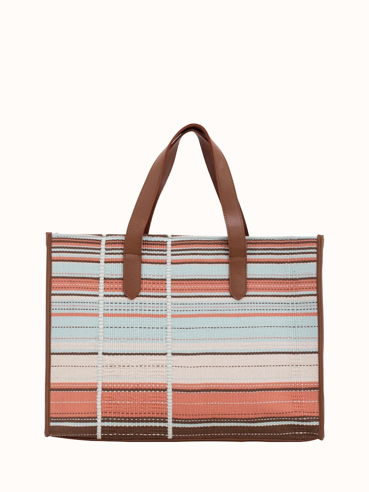 Front view of multicolor leather & textile Nagaland loin loom tote bag showcasing vibrant patterns