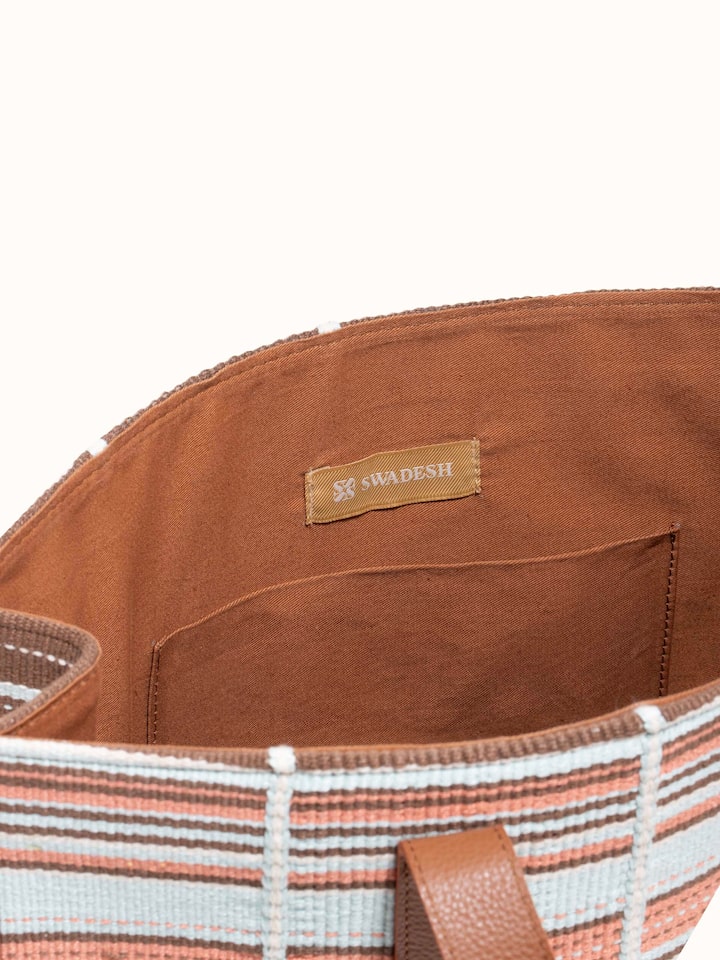 Detailed view of multicolor leather & textile Nagaland loin loom tote bag emphasizing intricate weaving