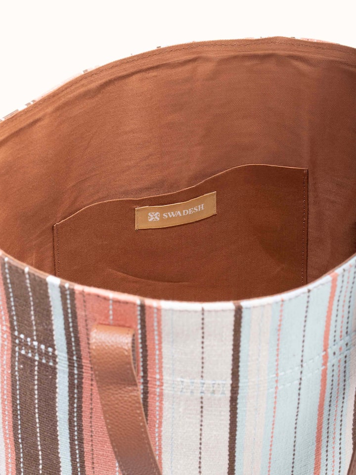 Close-up view of Leather & textile Nagaland loin loom tote bag emphasizing details