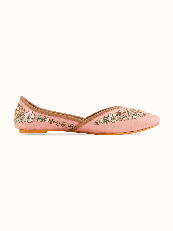 Back view of pink leather zardozi juttis showing the complete design