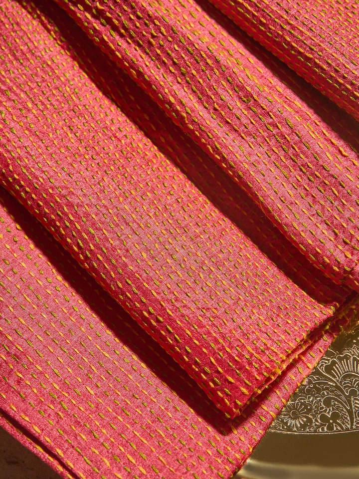 Close-up showing fine embroidery work and Tussar silk texture.
