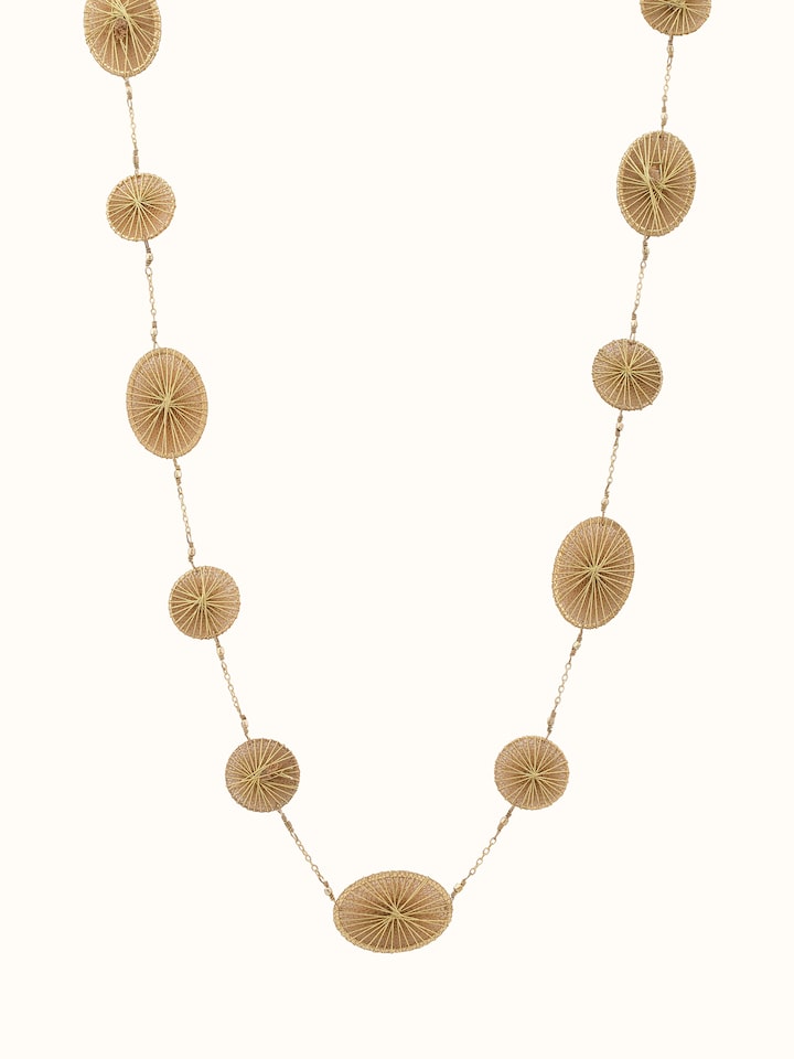 Front view of string craft long necklace featuring a unique and colorful design