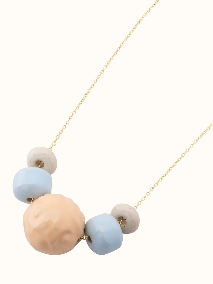 close view of Ceramic long necklace emphasizing unique craftsmanship