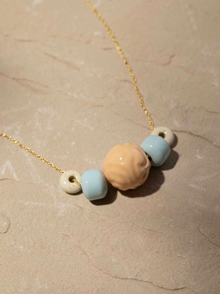 Top view of Ceramic long necklace emphasizing unique craftsmanship