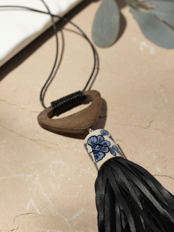 Detailed close-up of ceramic long necklace showcasing its fine design and details