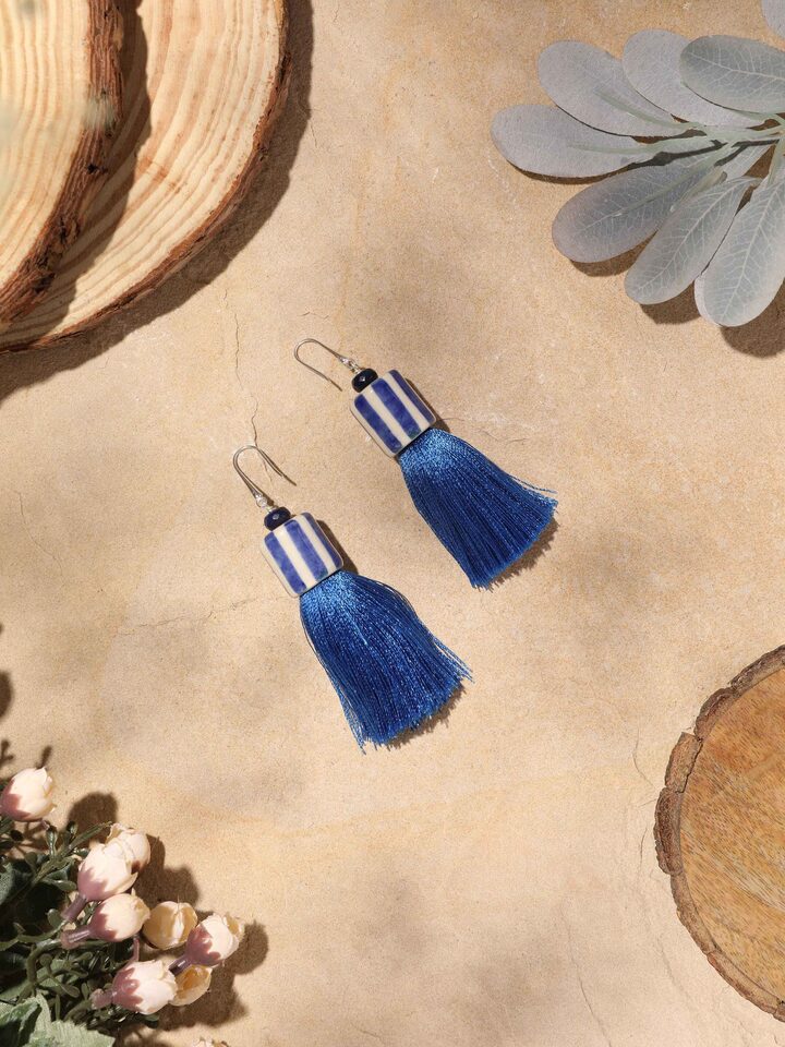Side view of Ceramic Drop Earrings showcasing intricate ceramic design.