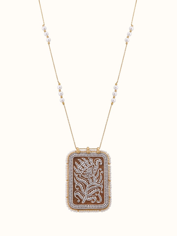 Front view of Wood Block Carving Long Necklace showcasing intricate wood block carvings and elegant design.