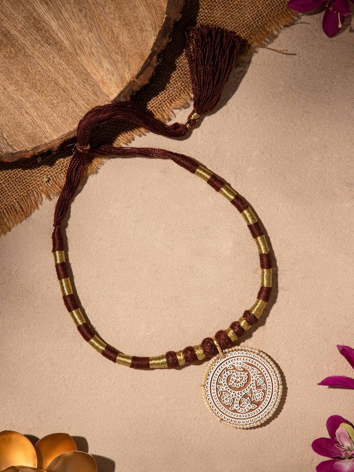 Close-up of Wood Block Carving Collar Necklace emphasizing detailed craftsmanship