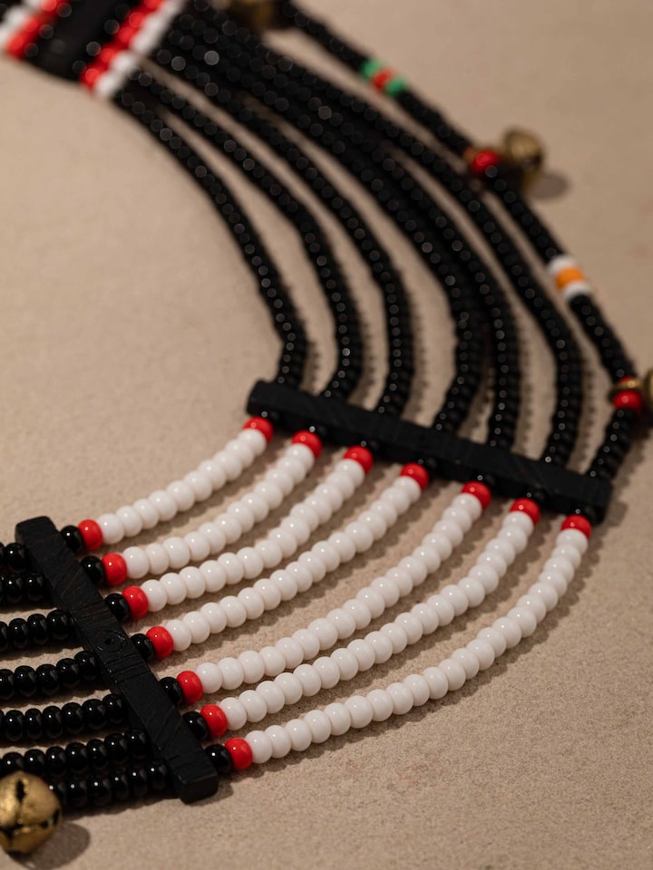 Detailed view of Beads & Faux Bones Collar Necklace focusing on the vibrant colors and intricate patterns.