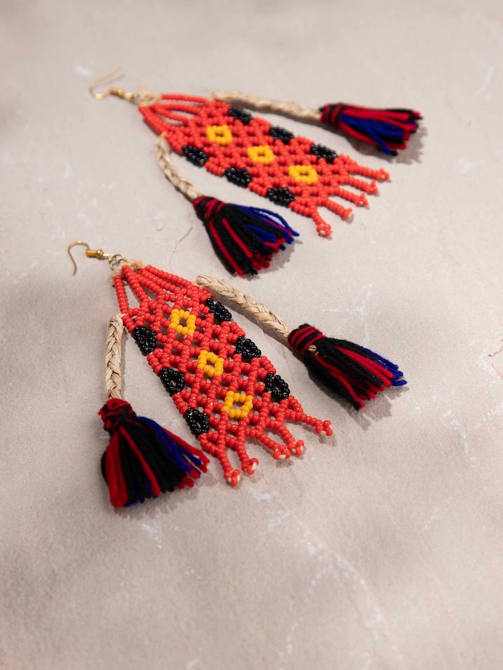Detailed close-up of Bead & Banana Fibre Drop Earrings focusing on the intricate beadwork and natural fibre.