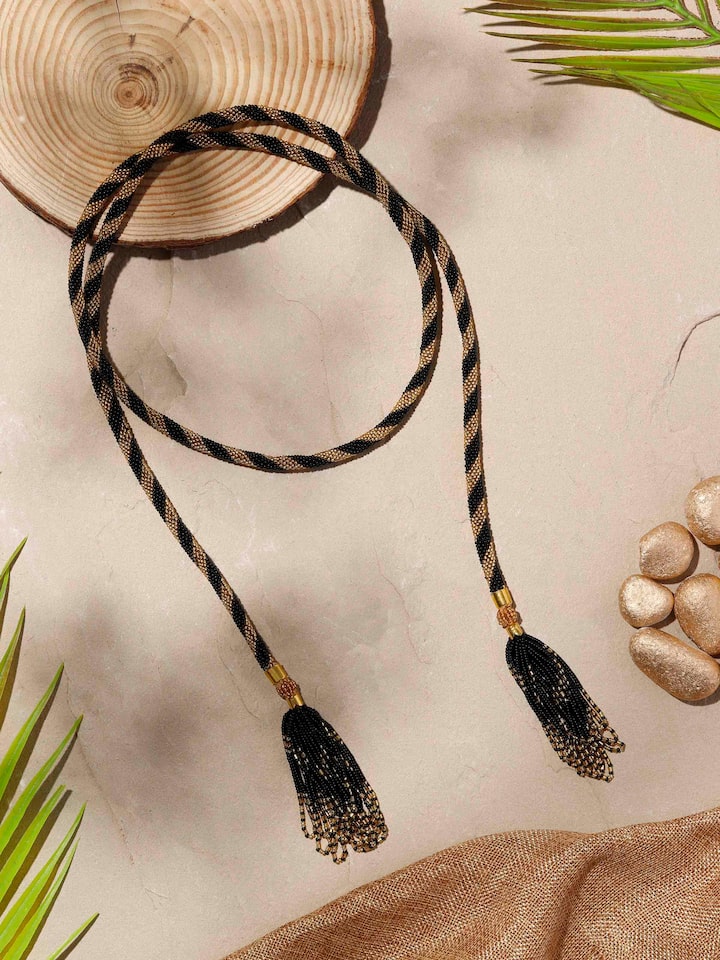 Styled detail view of Glass Beads Long Necklace worn around the neck, shown in an alternate styled shot